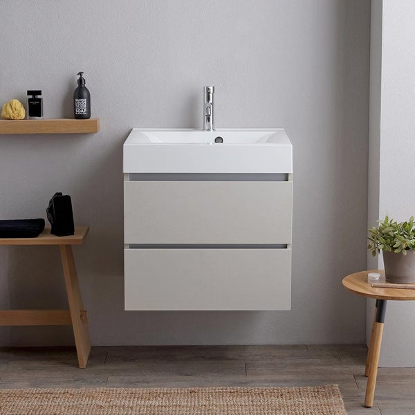 Waschtisch mit zwei Schubladen und Armatur im Badezimmer