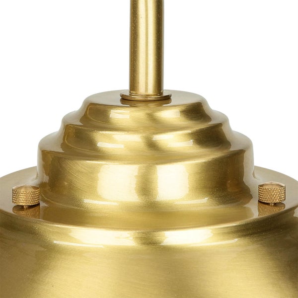 Detailaufnahme einer goldenen Lampenhalterung