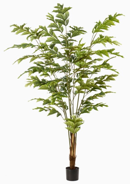 Künstliche Pflanze Tradescantia im schwarzen Topf mit grün-rosa gestreiften Blättern.