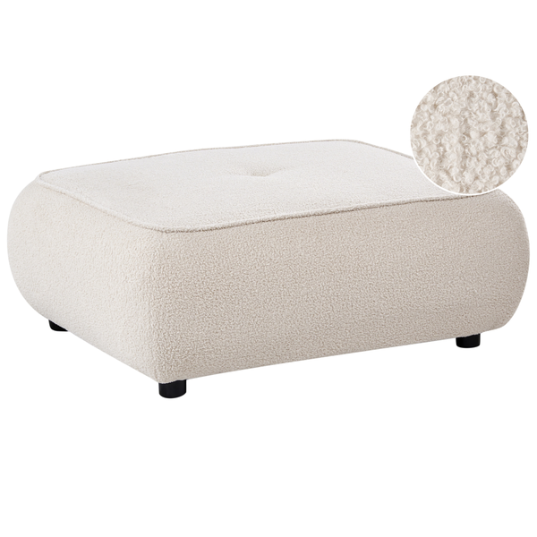 Polsterhocker mit Teddy-Stoffbezug, rechteckige Form, abgerundete Ecken, schwarze Füße, Detailansicht der Oberflächenstruktur.