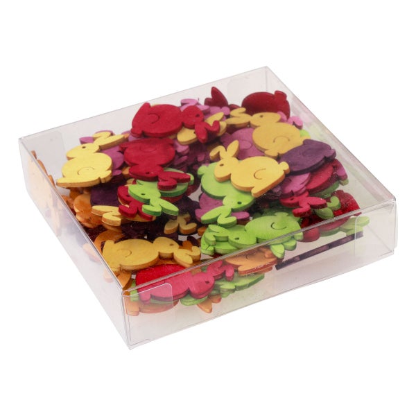 Dekorative Streuteile in Hasenform aus Filz in einer transparenten Box.