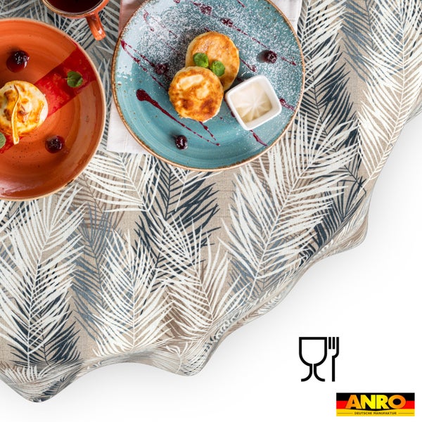 Tischdecke mit Palmblatt-Muster und Leinenoptik. Lebensmittelmittelecht. Anro Logo.