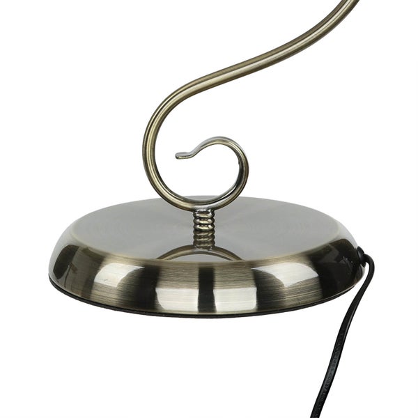 Detailaufnahme des Sockels einer Lampe mit Kabelanschluss