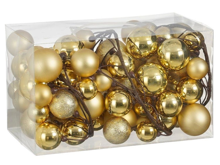 Set mit goldenen Weihnachtskugeln in verschiedenen Größen und Oberflächenstrukturen verpackt in einer transparenten Box
