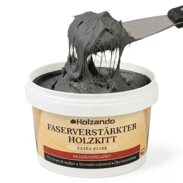 Holzando faserverstärkter Holzkitt in der 1 Kilogramm Dose, grau, für innen und außen, schnelltrocknend, faserige Masse auf einem Spachtel.