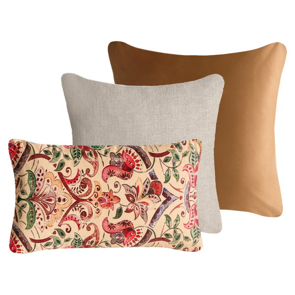 Drei Zierkissen mit verschiedenen Designs