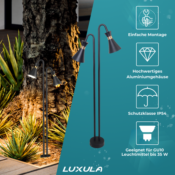 Zwei schwarze Luxula Gartenstrahler mit Lampenschirmen neben einem Baum