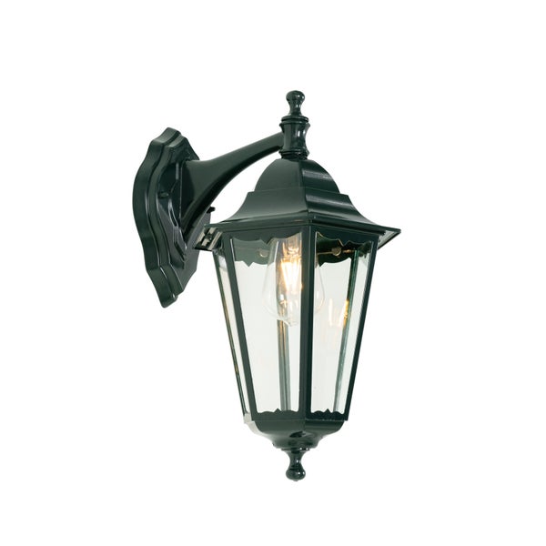 Klassische Außenwandleuchte aus Metall und Glas in Dunkelgrün mit sichtbarem Leuchtmittel.