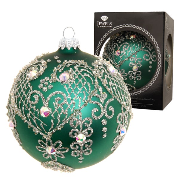 Christbaumkugel mit Schmuckelementen und zugehöriger Verpackung