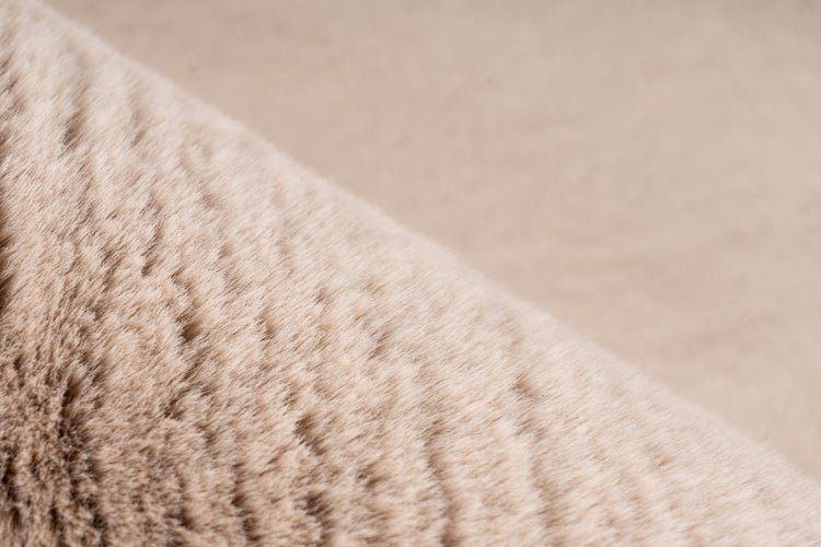 Strukturaufnahme eines weichen Kunstfell Materials für Textilien und Heimtextilien
