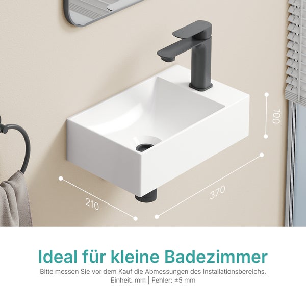 Weißes Waschbecken mit Armatur für das Badezimmer mit Maßangaben