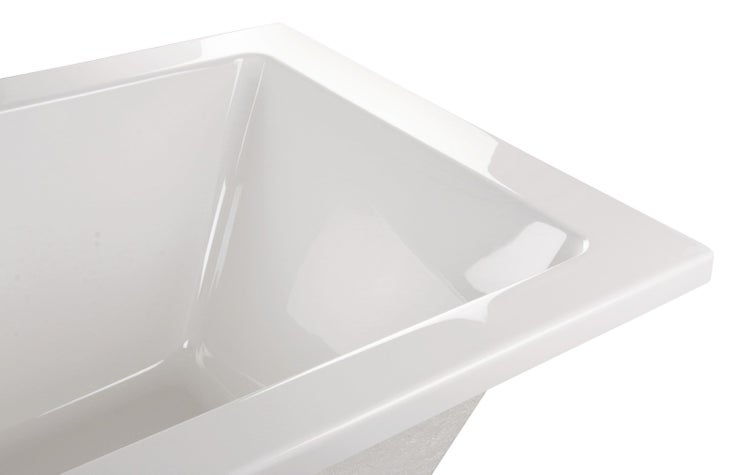 Detailansicht einer modernen Einbaubadewanne mit glatter Oberfläche für das Badezimmer.