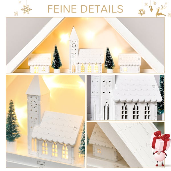 Detailansicht einer beleuchteten Weihnachtsdekoration aus Holz mit einem Winterdorf, bestehend aus einer Kirche, Häusern und Tannenbäumen.