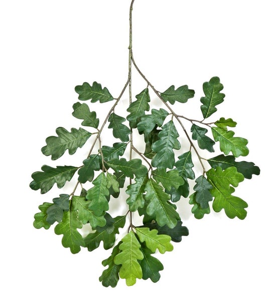 Künstlicher Eichenzweig mit grünen, gelappten Blättern für Dekorationszwecke.