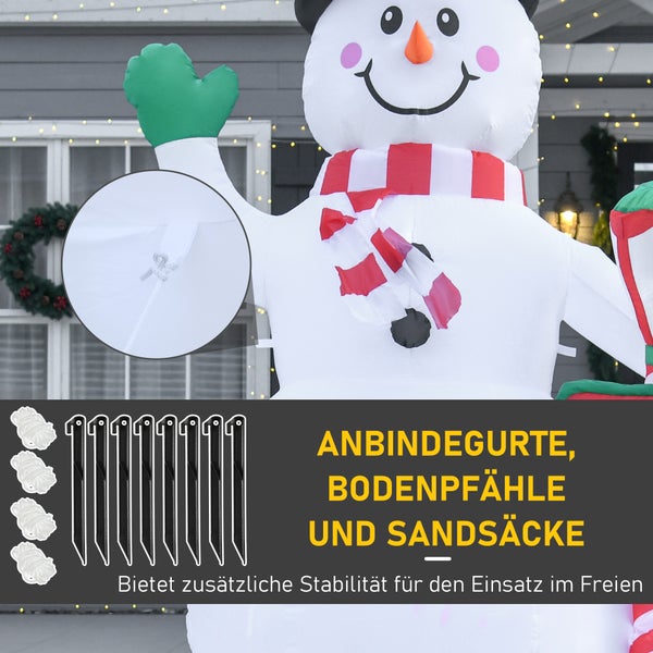 Aufblasbarer Schneemann mit Befestigungszubehör wie Erdnägeln, Seilen und Sandsäcken für Stabilität im Freien.