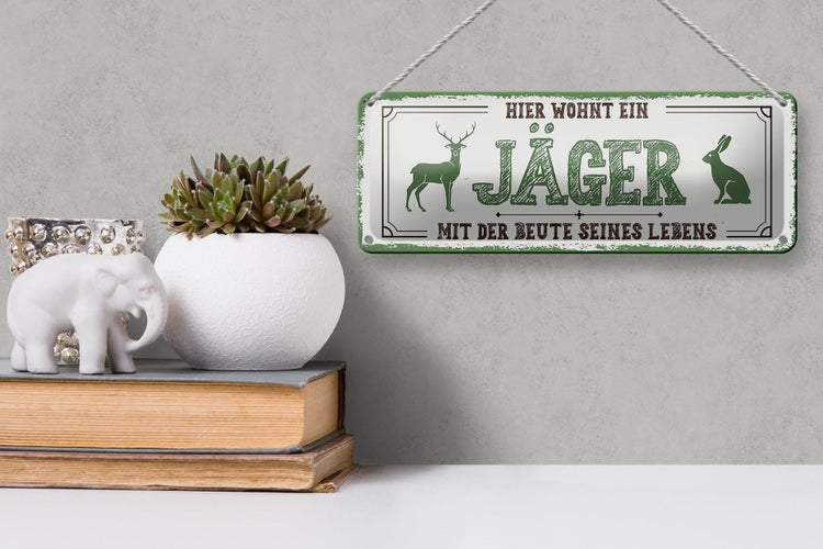 Blechschild Spruch 27x10cm Hier wohnt ein Jäger mit der Beute