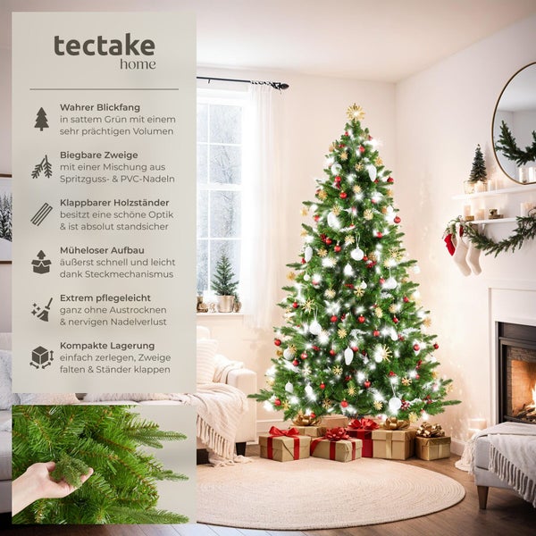 Ein künstlicher Tectake Weihnachtsbaum mit biegbaren Zweigen aus Spritzguss und PVC Nadeln, dekoriert in einem Wohnzimmer neben einem Kamin.