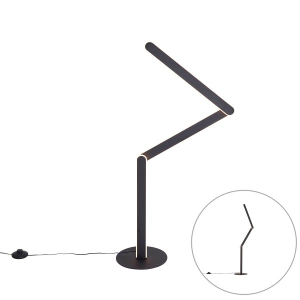 Moderne schwarze LED-Stehleuchte in Zickzack-Form mit rundem Fuß und Fußschalter.