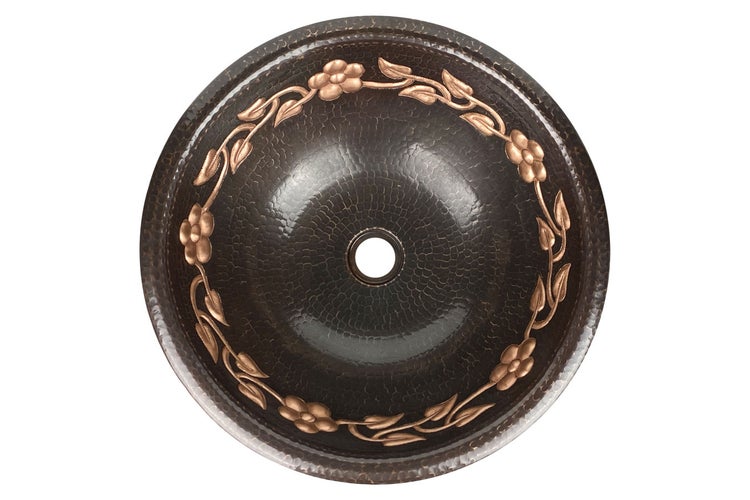 Rundes Waschbecken aus gehämmertem Kupfer mit floralem Dekor