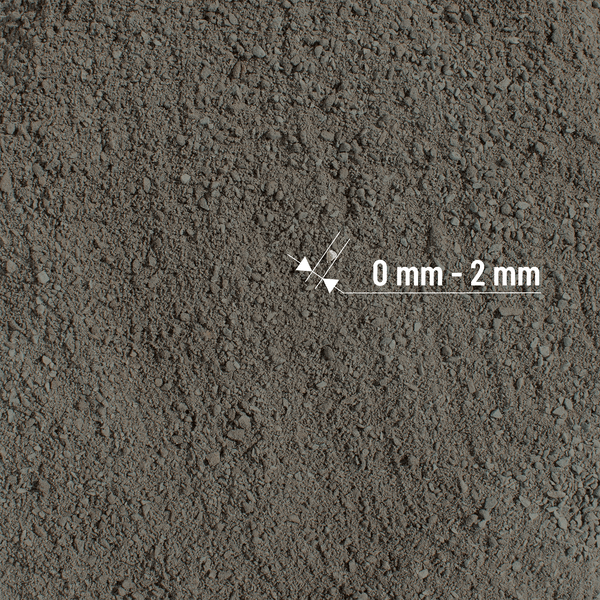 Nahaufnahme von Sand oder feinem Kies mit einer Körnung von 0 bis 2 Millimeter.