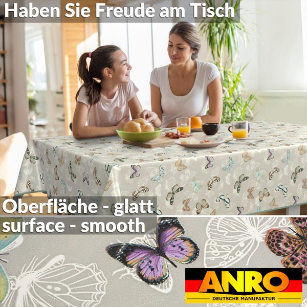 Tischdecke mit Schmetterlingsmuster auf einem Esstisch, umgeben von einer Frau und einem Mädchen, ANRO Logo