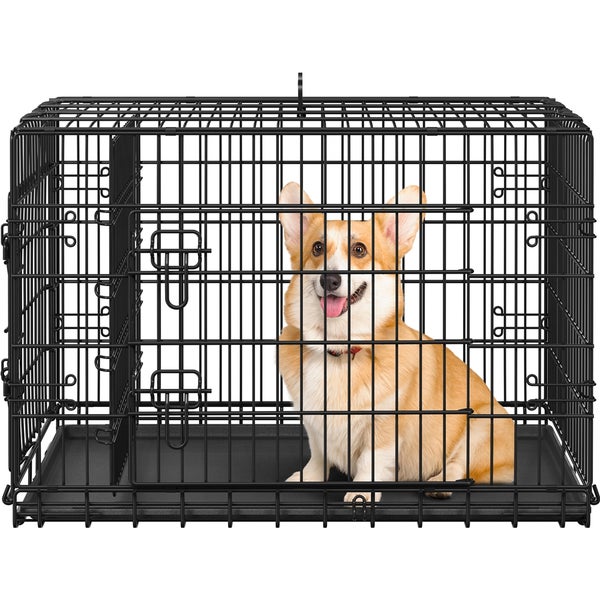 Ein Corgi sitzt in einem schwarzen Draht-Hundekäfig.