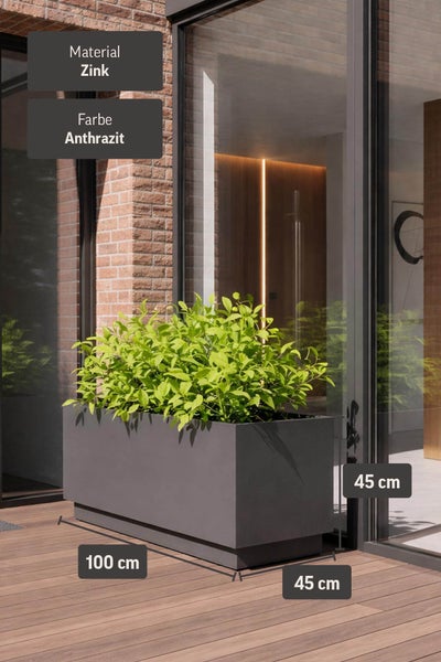 Rechteckiger Pflanzkübel aus Zink in Anthrazit, 100 mal 45 mal 45 Zentimeter, mit grünen Pflanzen auf einer modernen Holzterrasse.