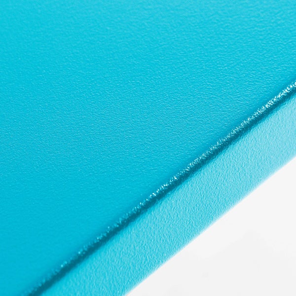 Detailansicht einer strukturierten blauen Oberfläche.