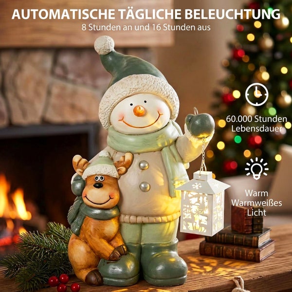 Dekorative Schneemannfigur mit Rentier und leuchtender Laterne für weihnachtliche Raumdekoration mit automatischem Timer und warmweißem Licht.