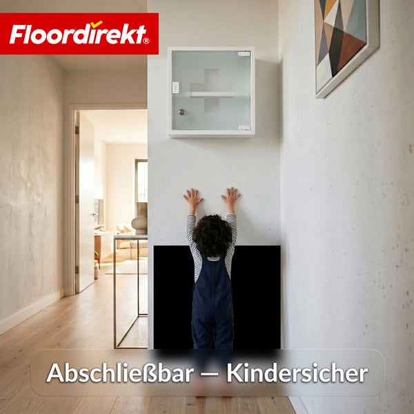 Abschließbarer Medizinschrank aus Metall mit Milchglastür an einer Wand montiert, außerhalb der Reichweite eines Kindes. Floordirekt Logo.