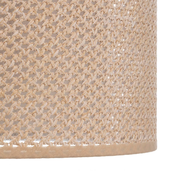 Detailansicht eines Lampenschirms aus geflochtenen Naturfasern mit sichtbarer Textur und Stoffkante unten.