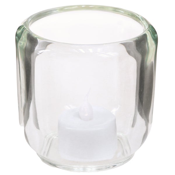 Teelichthalter aus klarem Glas mit einem weißen LED-Teelicht