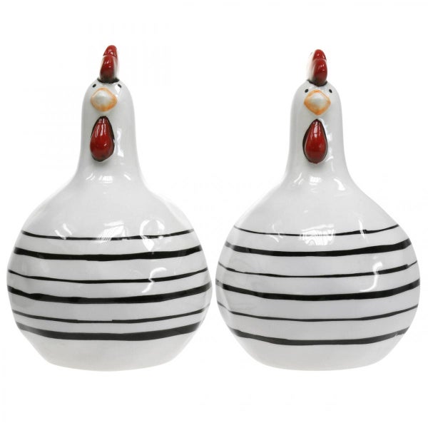 Zwei dekorative Hühnerfiguren mit Streifenmuster