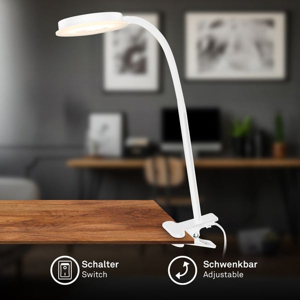 Weiße LED-Klemmleuchte mit biegsamem Arm und Schalter, schwenkbar und an einer Tischplatte in einem Büro befestigt.