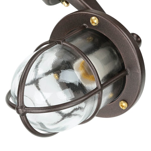 Wandleuchte mit transparentem Glas und Schutzgitter