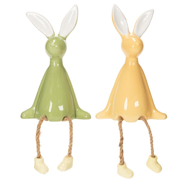 Zwei dekorative Osterhasenfiguren aus Keramik mit hängenden Beinen