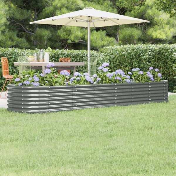 Hochbeet aus Metall mit Blumen im Garten