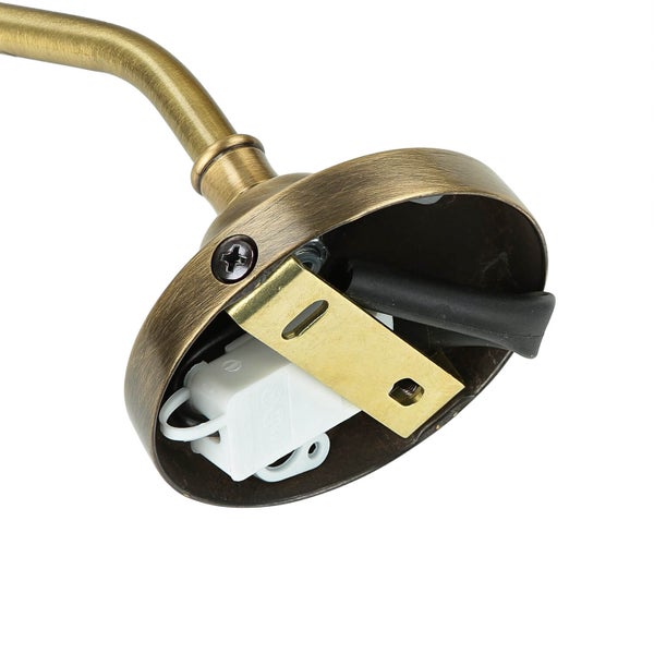 Detailaufnahme einer Wandleuchte mit freiliegender elektrischer Installation