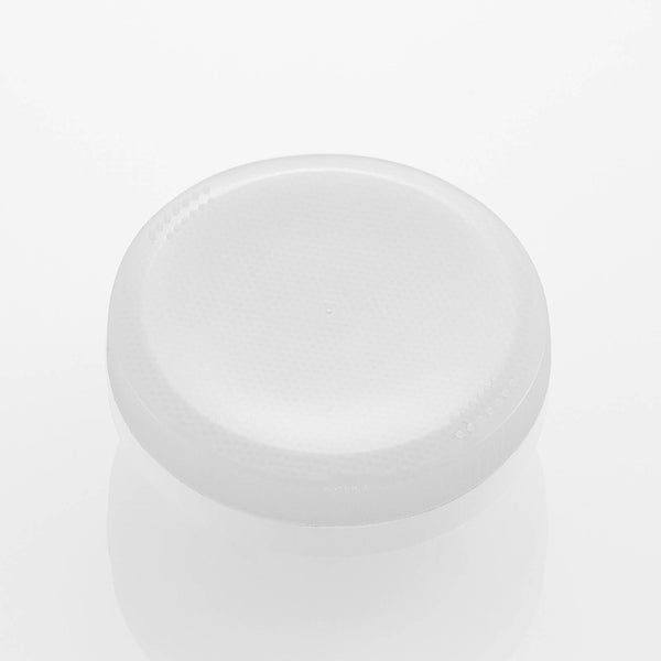 Weißer runder Möbelgleiter aus Kunststoff.