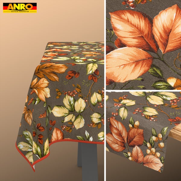 ANRO Logo, Tischdecke mit herbstlichem Blatt- und Beerenmotiv, eingefasstem Saum und Detailansicht der Gewebestruktur.