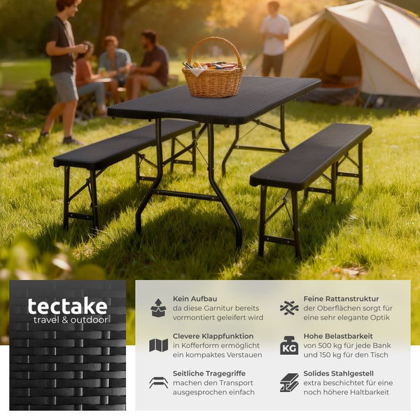 Gartenset mit Tisch und Bänken auf Rasen mit Personen und Zelt im Hintergrund