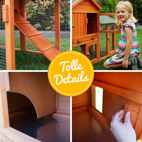 Detailansicht eines zweistöckigen Kleintierstalls aus Holz mit Rampe, ausziehbarer Wanne, Schiebeverschluss und einem Kind auf Rasen.