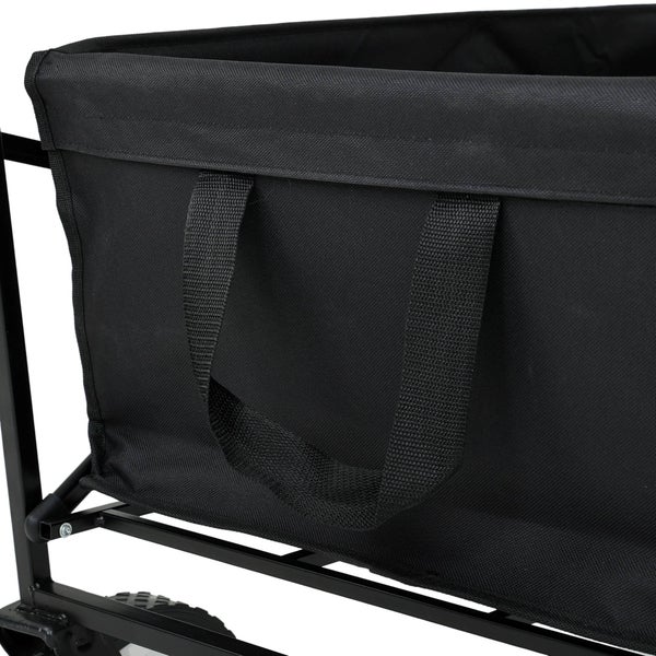 Detailansicht eines Bollerwagens mit schwarzem Stoffbezug und Tragegriffen