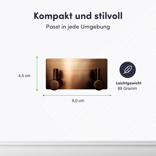 Kupferfarbener zweifacher Wandhaken aus gebürstetem Metall, Höhe 4,5 Zentimeter, Breite 9,0 Zentimeter, Gewicht 89 Gramm, leichtgewichtig.