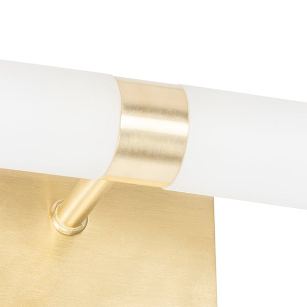 Detailaufnahme einer goldenen LED-Wandleuchte