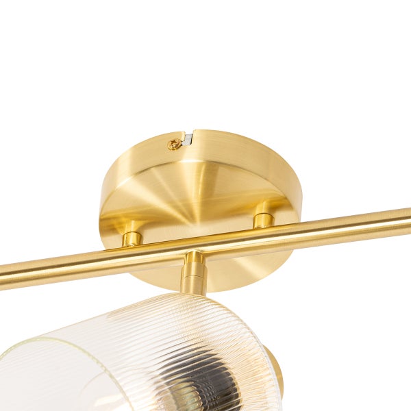 Detailansicht einer Deckenleuchte mit Lampenschirm aus Glas