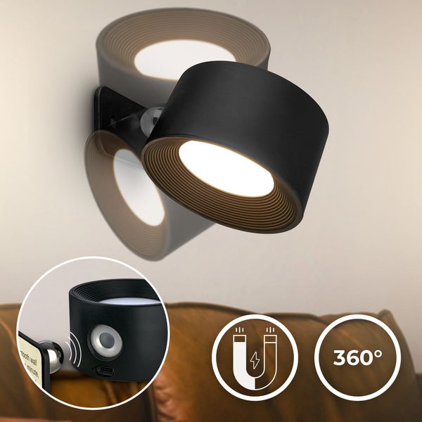Schwarze runde LED Wandleuchte mit 360 Grad Drehfunktion und Magnethalterung.