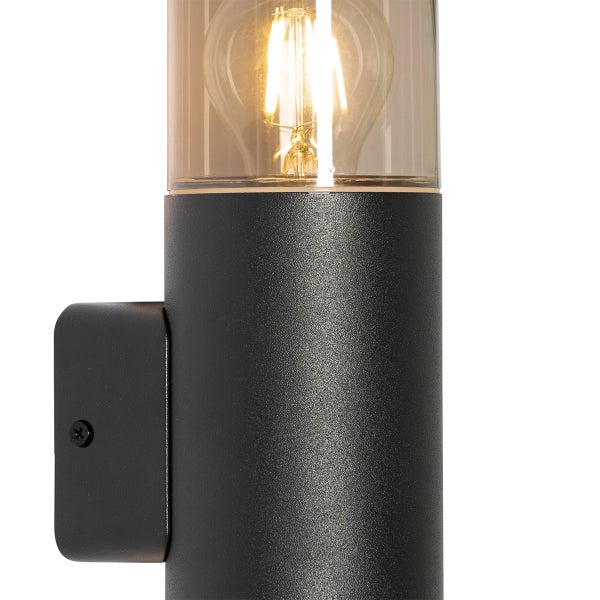 Außenwandleuchte, zylindrisch, Metall anthrazit, Glasschirm klar, mit leuchtendem Filament Leuchtmittel.