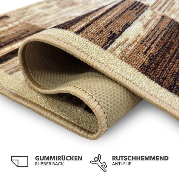 Detailansicht einer Teppichmatte mit geometrischem Muster und rutschfester Unterseite.