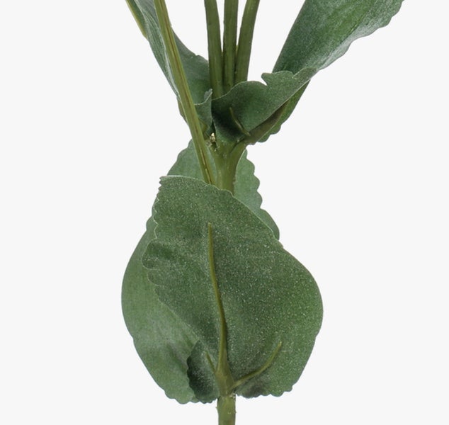 Nahaufnahme einer künstlichen Pflanze mit grünen Blättern und Stiel.